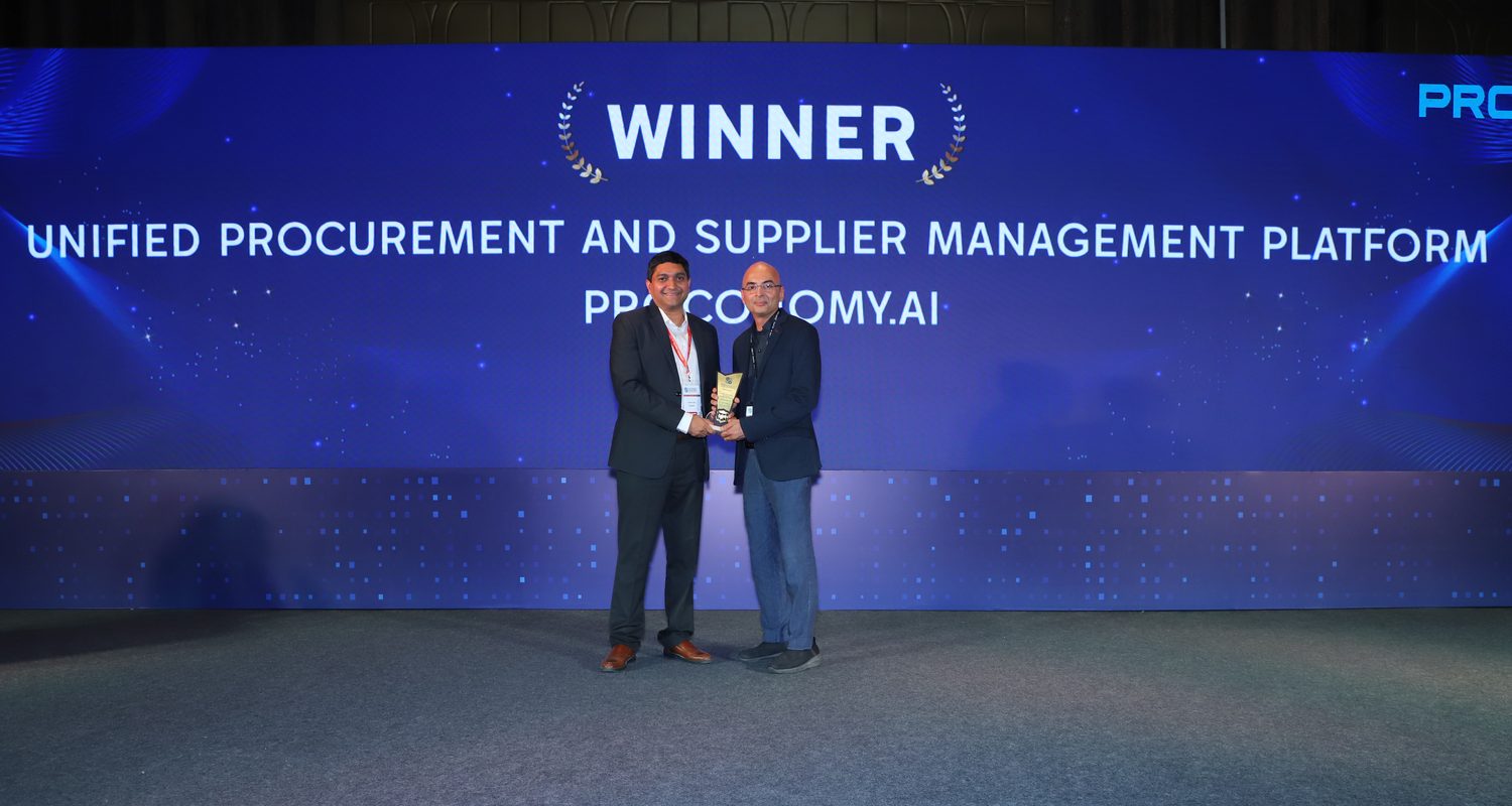 Proconomy receiving Unified Procurement and Supplier Management Platform on stage, the summit screen behind reading Winner, Unified Procurement and Supplier Management Platform, Proconomy.ai